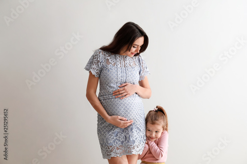 Pregnant mother and young d...