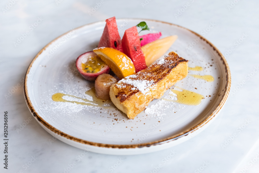 Close up of yummy french toast with fresh fruits.