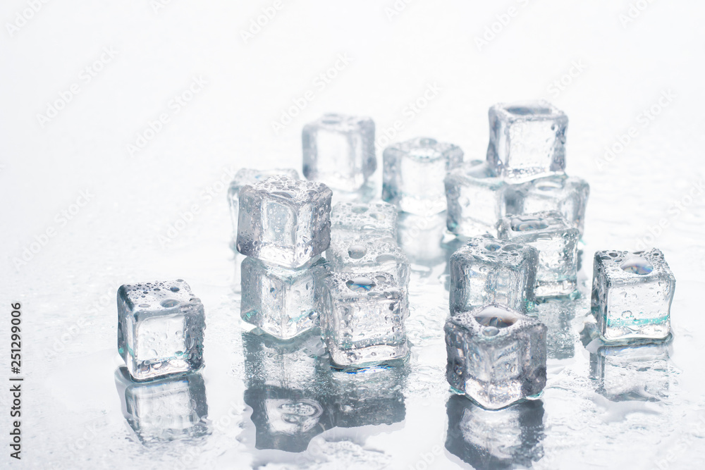Ice cubes on a white background. Cooling Concept, Food Ice Ice cubes on a white background. Cooling Concept, Food Ice