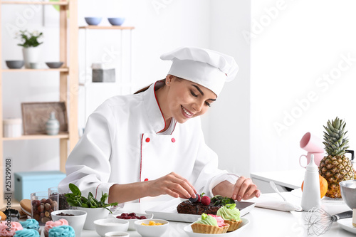 Young female confectioner d...