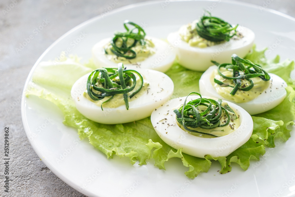 Tasty deviled eggs on plate, closeup Tasty deviled eggs on plate, closeup