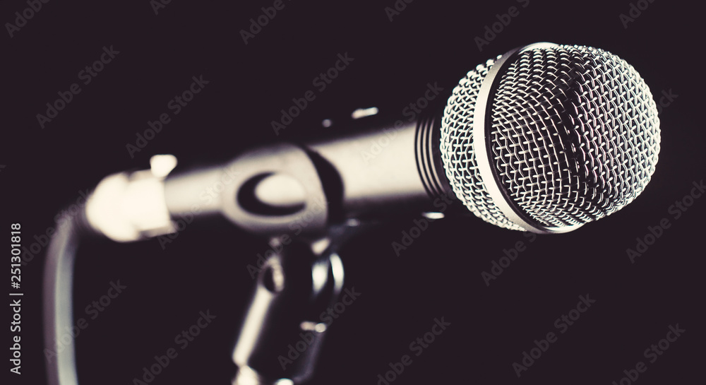 Microphone, mic, karaoke, concert, voice music. Vocal audio mic on a bleck background. Singer in karaokes, microphones. Live music, audio equipment. Closeup microphone. Karaoke concert, sing sound. Microphone, mic, karaoke, concert, voice music. Vocal audio mic on a bleck background. Singer in karaokes, microphones. Live music, audio equipment. Closeup microphone. Karaoke concert, sing sound.