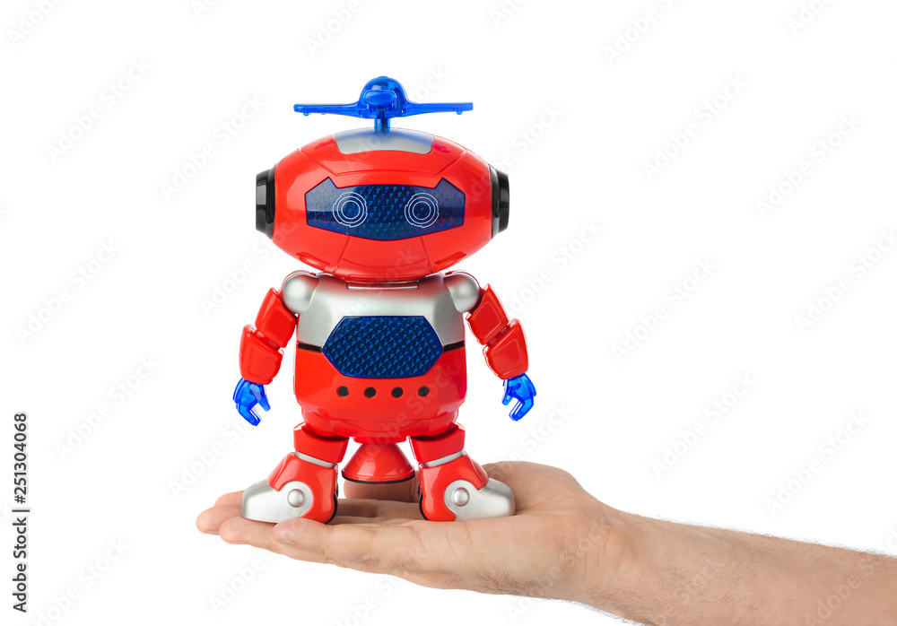 Naklejka premium Hand with toy robot