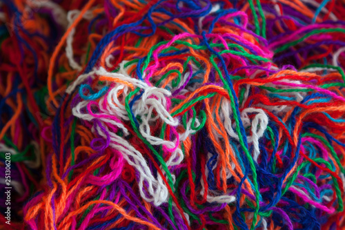 The intricated multi-colored yarn threads, close up