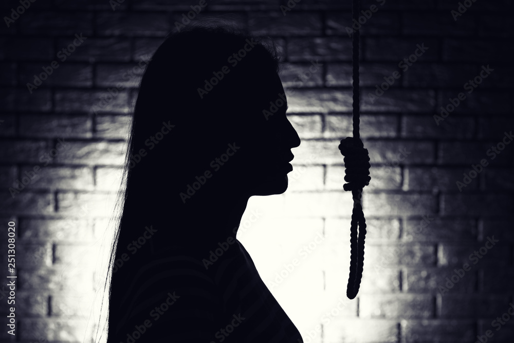 Silhouette Of Woman With Noose On Dark Background Suicide Concept