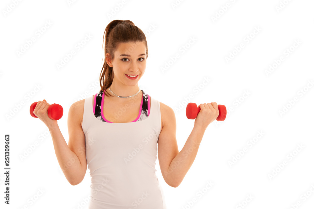 Beautiful young athlete woman workout with dumbbells isolated over white background Beautiful young athlete woman workout with dumbbells isolated over white background