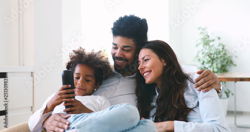 Cute african american family enjoying time at home