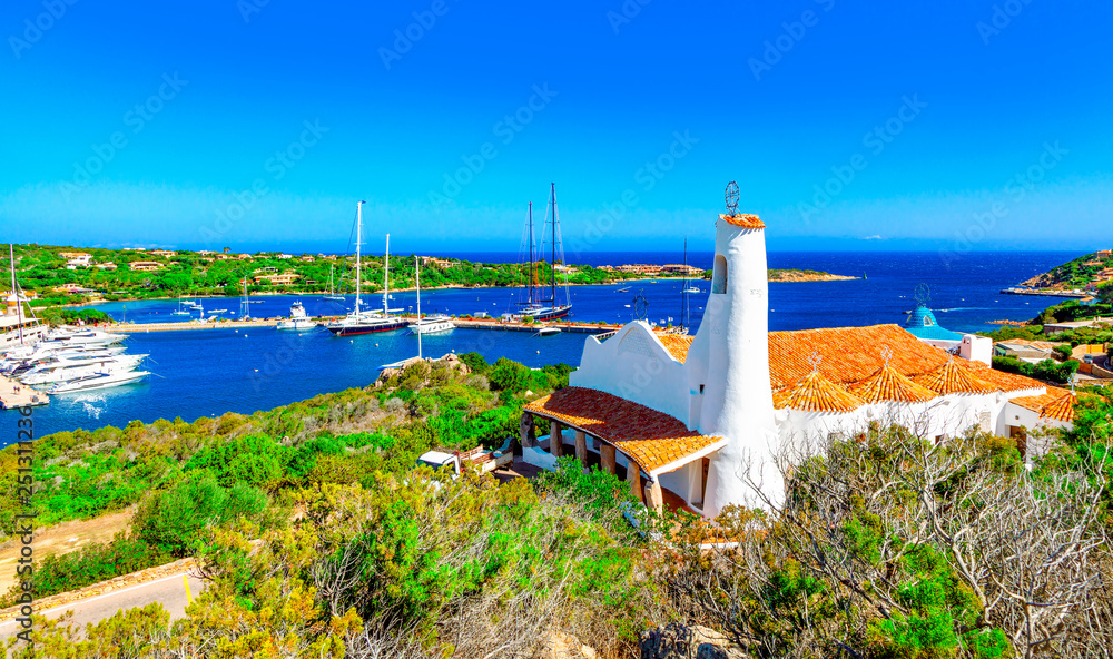 View of Porto Cervo and Stella Maris church, Italian seaside resort in northern Sardinia, Italy. Centre of One of the most expensive resorts in the world.
