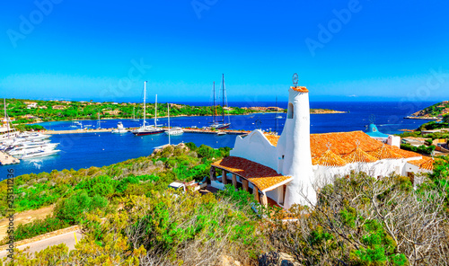 Obraz na płótnie View of Porto Cervo and Stella Maris church, Italian seaside resort in northern Sardinia, Italy. Centre of One of the most expensive resorts in the world. w salonie