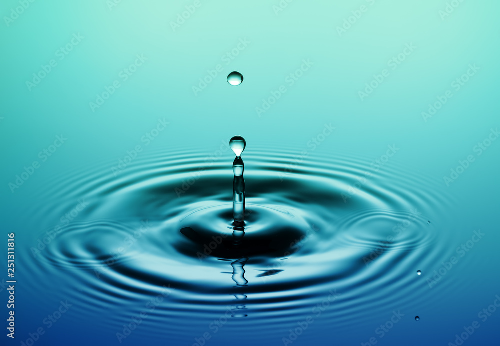 Water splash - falling drop of rain