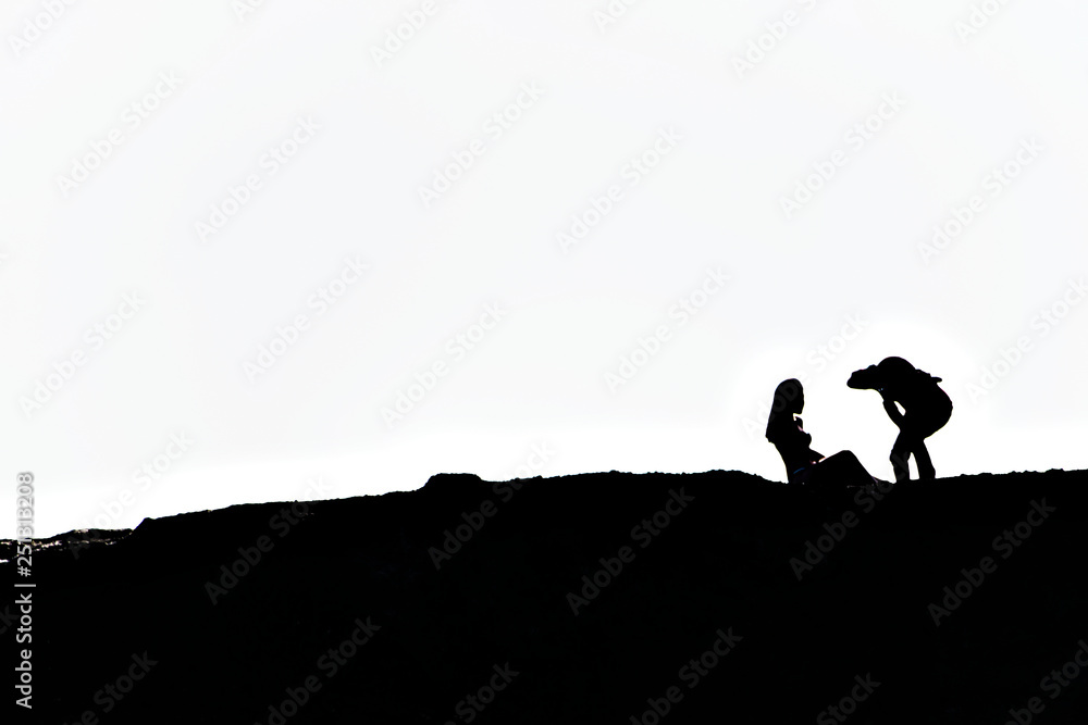 Silhouette of a photographer who was photographing models Silhouette of a photographer who was photographing models