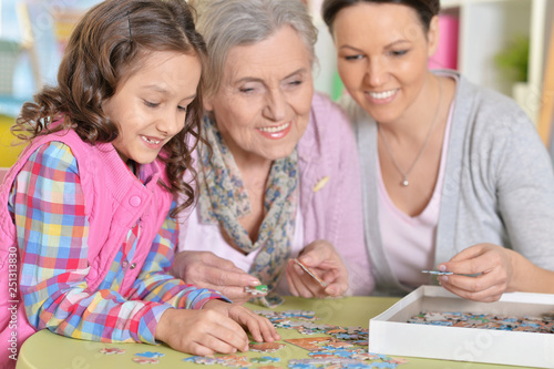 Portrait of grandmother with daughter and little granddaughter