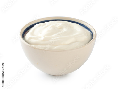 Bowl with tasty yogurt on white background