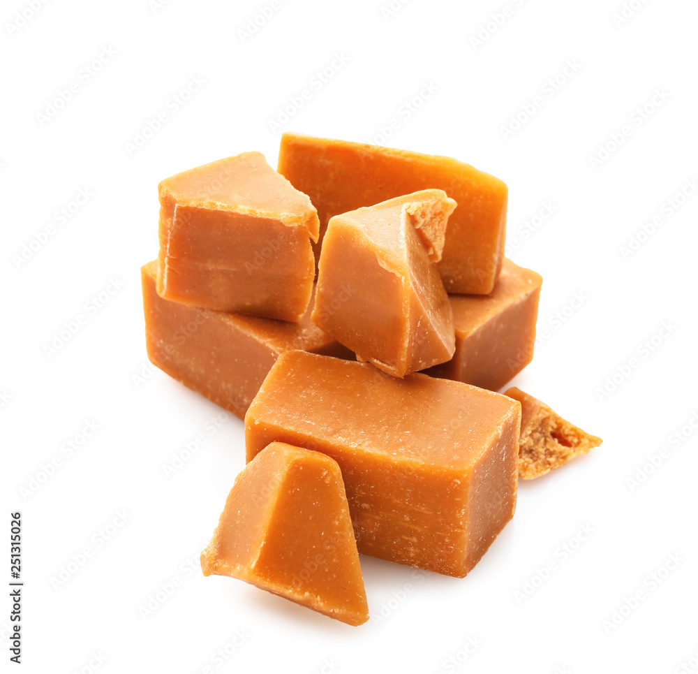 Tasty sweet caramel on white background Tasty sweet caramel on white background