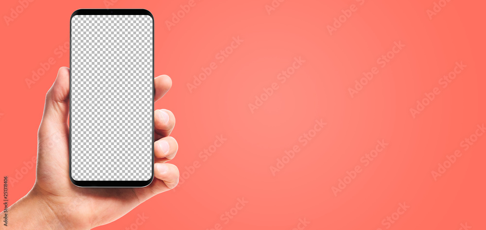 male hand holding bezel-less smartphone with transparent screen, isolated on living coral background . Screen is cut out with path - obrazy, fototapety, plakaty 