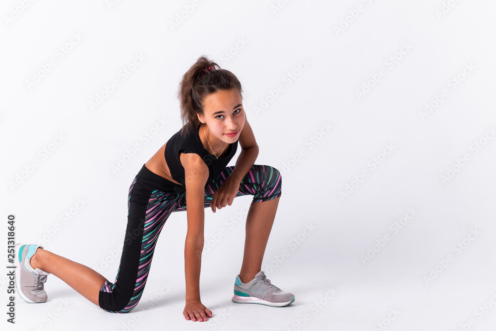 Young athletic girl isolated on white background Young athletic girl isolated on white background