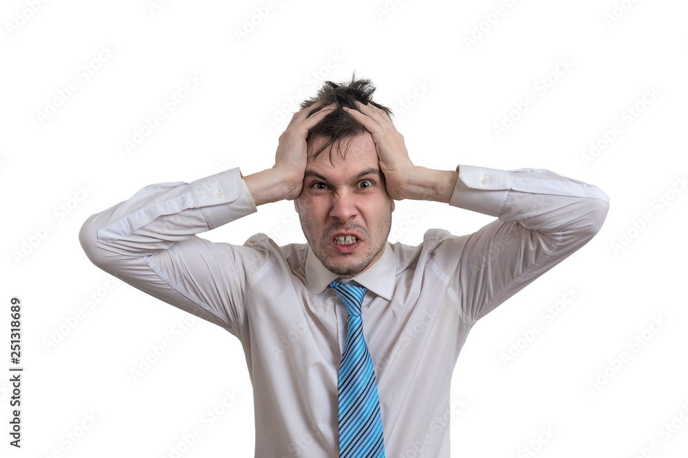 Angry businessman is holding his head. Isolated on white background. Angry businessman is holding his head. Isolated on white background.