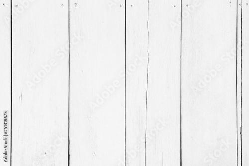 Wooden plank wood all antique cracked furniture weathered white vintage wallpaper texture background.
