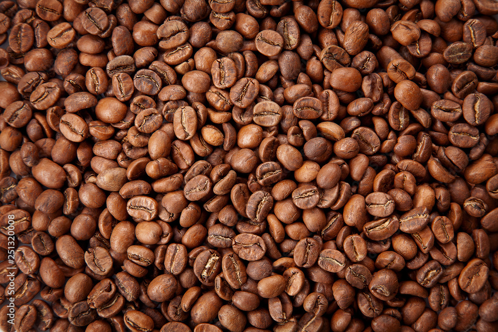 Roasted coffee beans texture. Close up view, top view Roasted coffee beans texture. Close up view, top view
