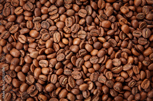 Roasted coffee beans texture. Close up view, top view