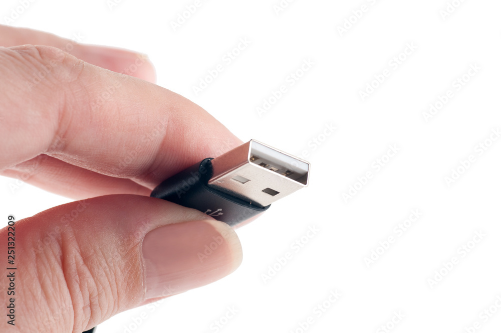 USB cable in the hands, isolated, closeup USB cable in the hands, isolated, closeup