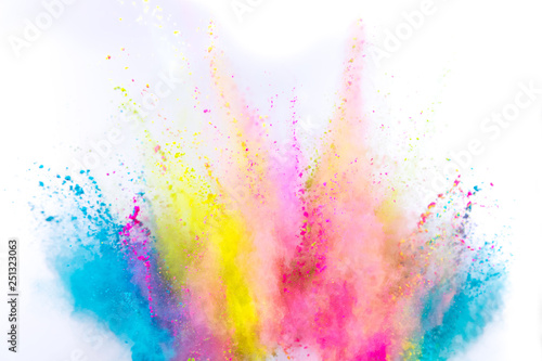 Colored powder explosion on white background. Freeze motion.