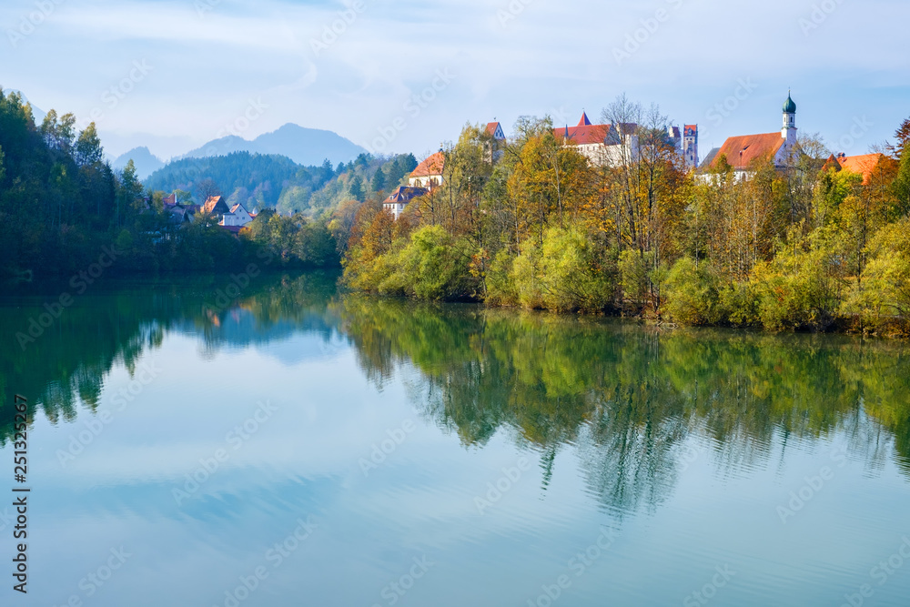 Colorful view of Fussen and Lech River on a sunny autumn day. Bavaria, Germany