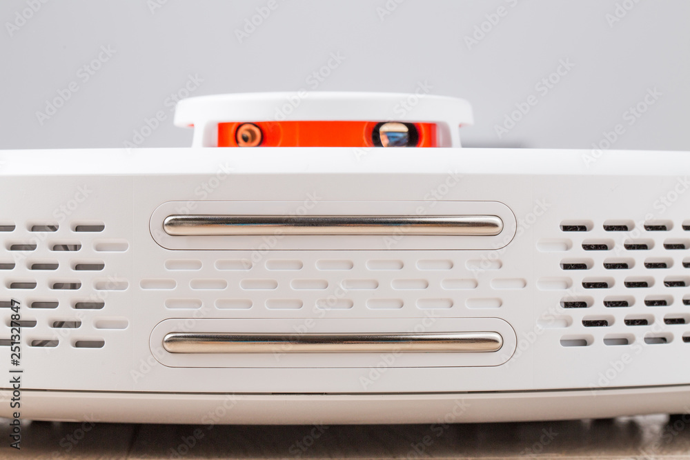 Fototapeta premium White robot vacuum cleaner