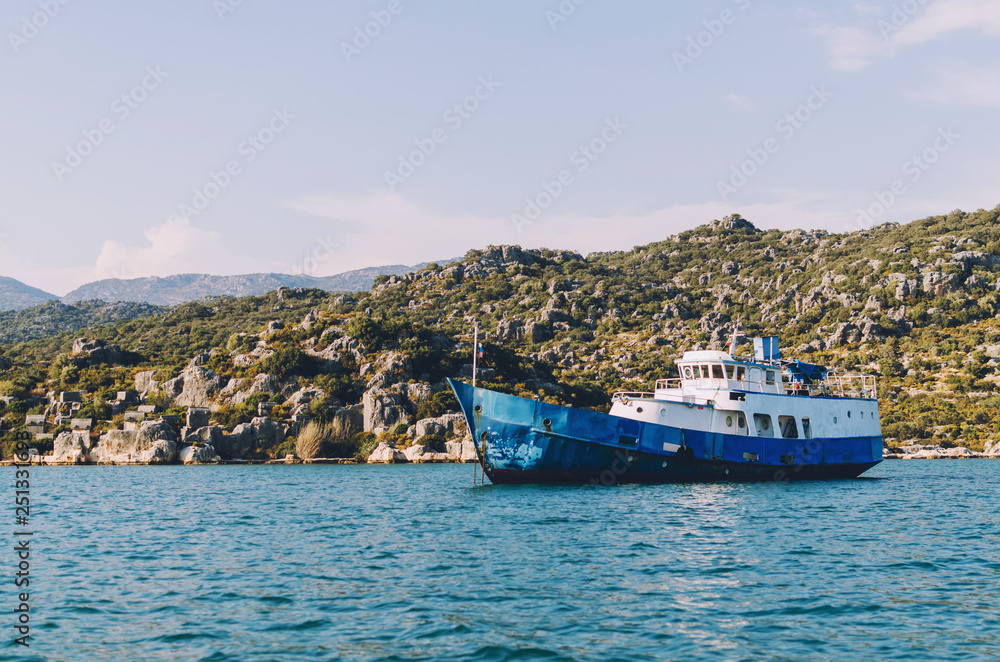 Old blue ship near Kekova coastal region, Demre, Turkey