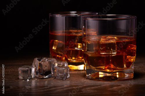 Glasses of whisky with ices