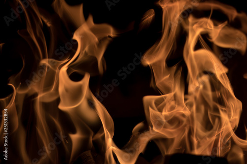 Faded fire flames on black background. Short shutter used. Great for background or overlay design