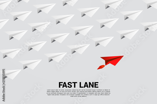 red origami paper airplane is move faster than group of white. Business Concept of fast lane for moving and marketing