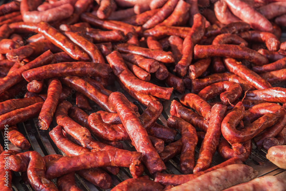 Top view of different kinds of fresh spanish sausages on the marketplace. food background Soft focus. Top view of different kinds of fresh spanish sausages on the marketplace. food background Soft focus.