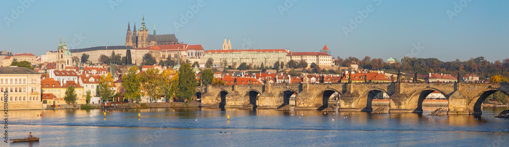 PRAGUE, CZECH REPUBLIC - OCTOBER 11, 2018:The panorama of Charles Bridge, Castle and Cathedral withe the Vltava river.