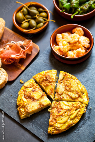Authentic Spanish tapas with padron peppers and traditional tortilla
