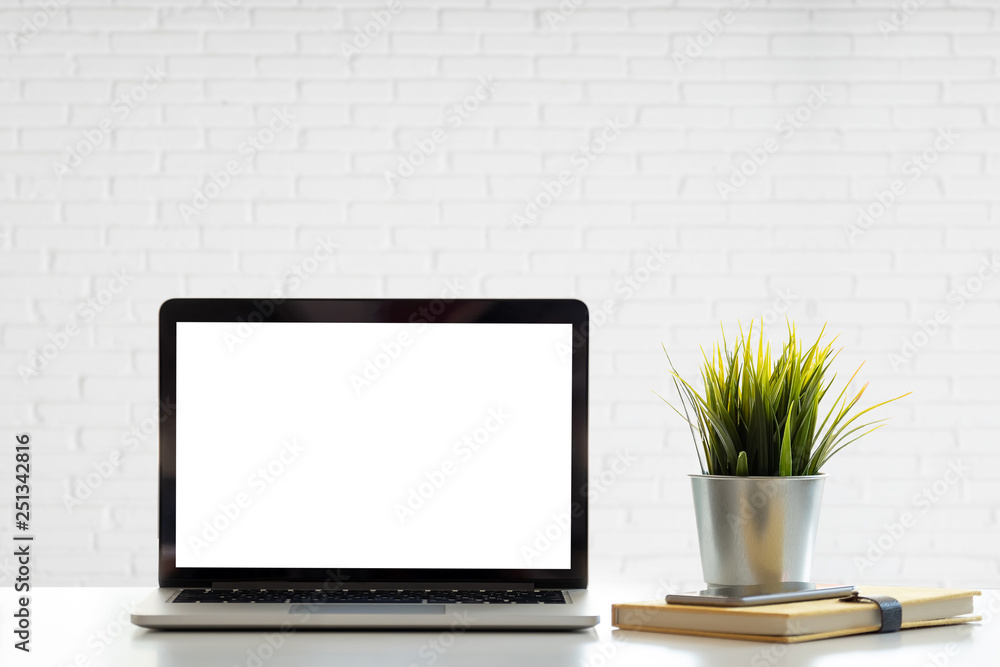 Mockup blank screen laptop on desk. Workspace with laptop and office supplies. Mockup blank screen laptop on desk. Workspace with laptop and office supplies.