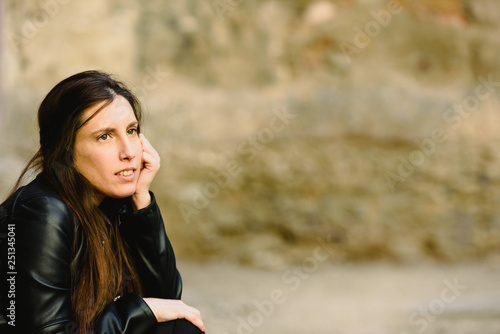 Portrait of young woman with worried expression, thoughtful about her future career. © Joaquin Corbalan