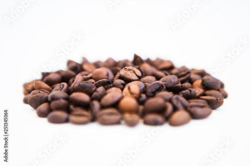Coffee beans on a white ground  close up