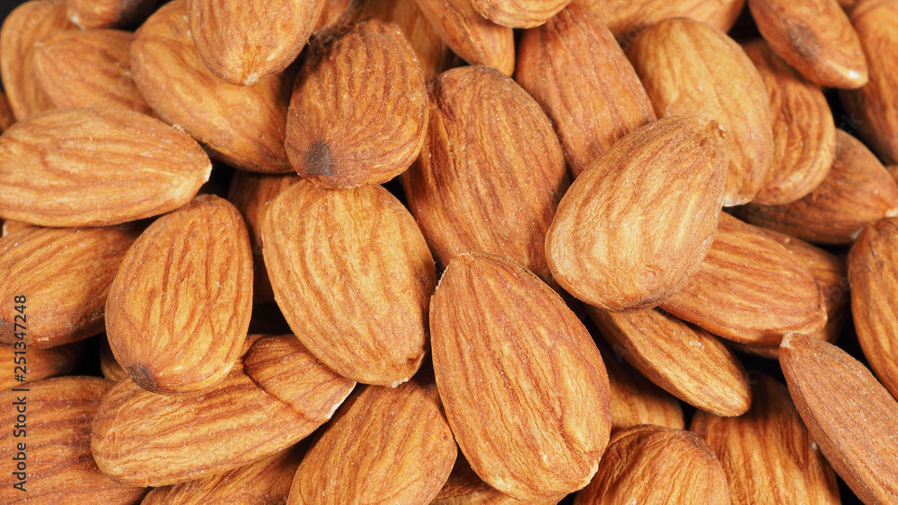 Group of Raw almonds close up. Group of Raw almonds close up.