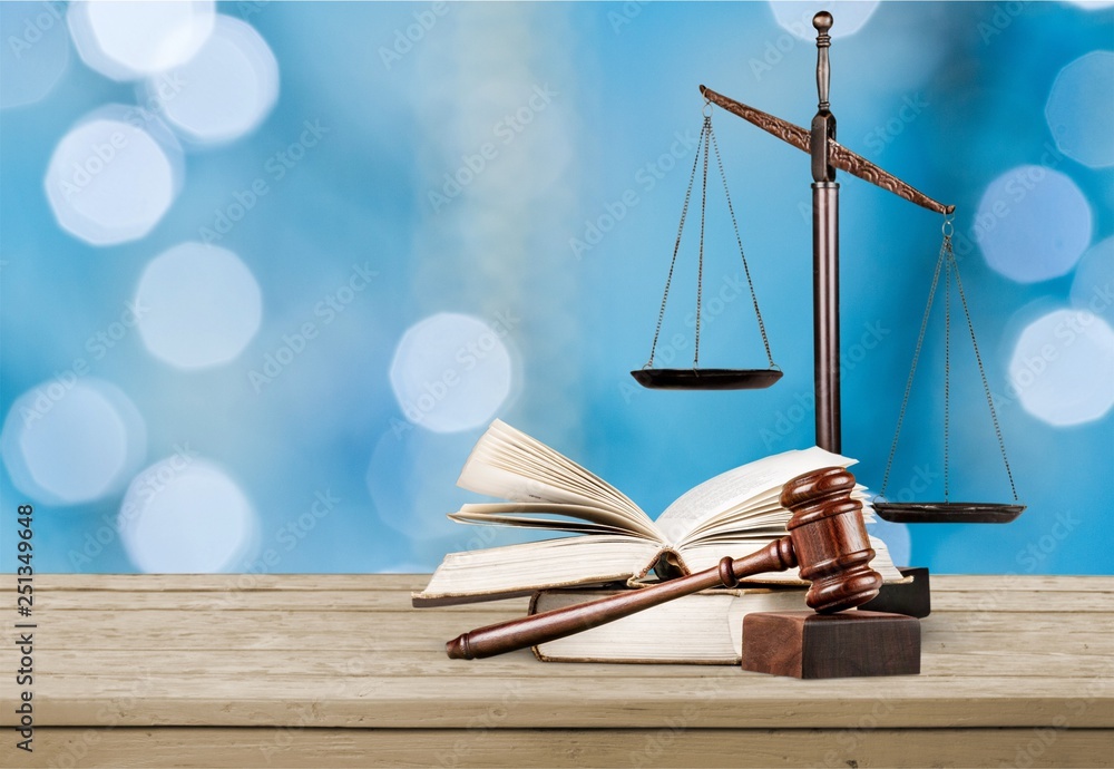Justice Scales and books and wooden gavel . Justice concept Justice Scales and books and wooden gavel . Justice concept