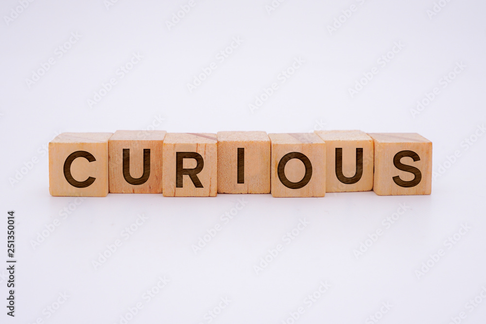 Curious Word Written In Wooden Cube Curious Word Written In Wooden Cube