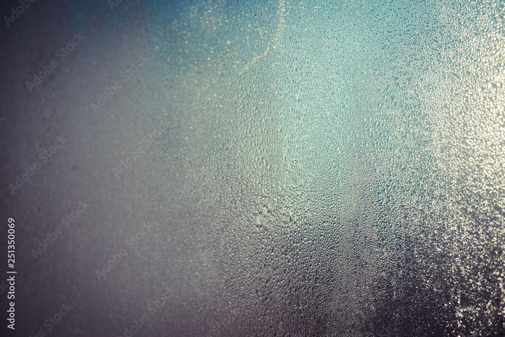 Fototapeta premium Foggy condensated window blurry textured outdoors background image