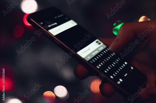 Man writing a message on phone 