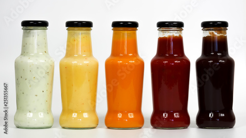 bottles with different sauces for barbecue
