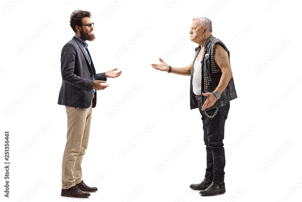 Bearded man having a conversation with an angry male punker in a leather vest Bearded man having a conversation with an angry male punker in a leather vest