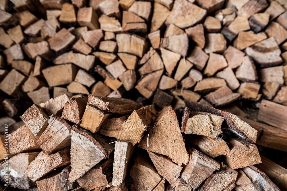 Birch firewood. Broken ax birch logs are in disarray Birch firewood. Broken ax birch logs are in disarray