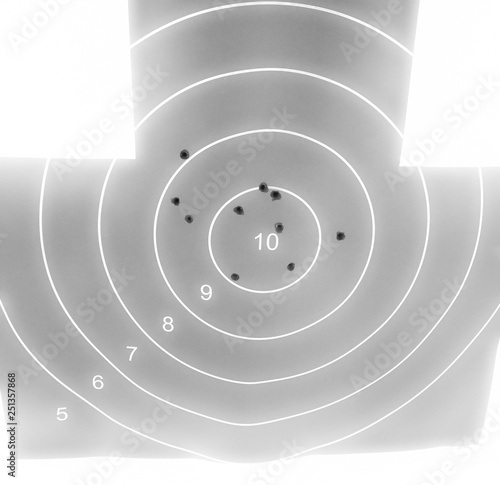 Black and white target with holes
