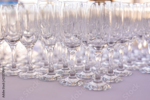 Blured background from wedding glasses filled with champagne