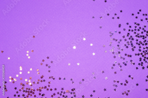 Silver glitter stars on purple background in vintage colors