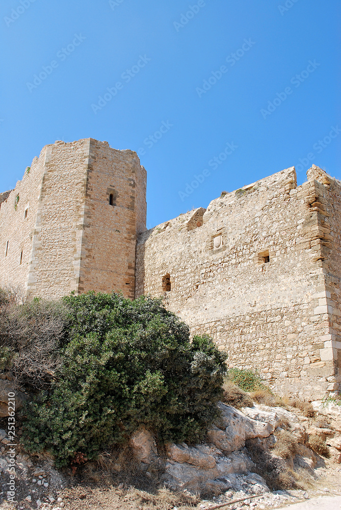 Close-up of stone ruins of walls and tower of Kritinia Castle, Kritinia Village, Rhodes Island, Greece